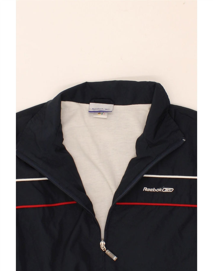 REEBOK Boys Tracksuit Top Jacket 10-11 Years Navy Blue Polyester Vintage Reebok and Second-Hand Reebok from Messina Hembry 
