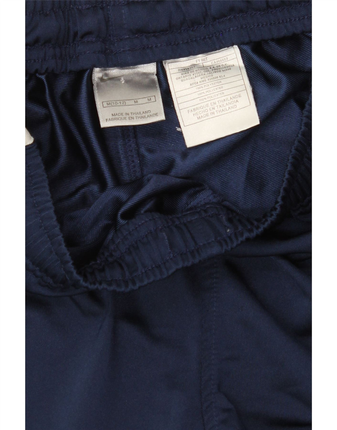 NIKE Boys Tracksuit Trousers 10-11 Years Medium  Navy Blue Colourblock Vintage Nike and Second-Hand Nike from Messina Hembry 