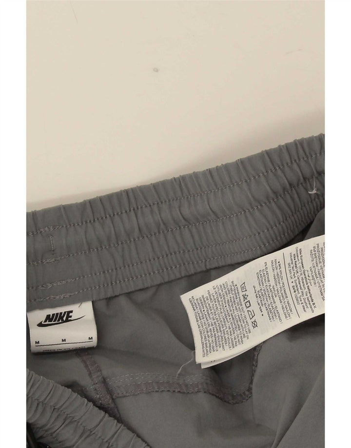 Męskie spodnie dresowe Nike Cargo Joggers Średni szary nylon