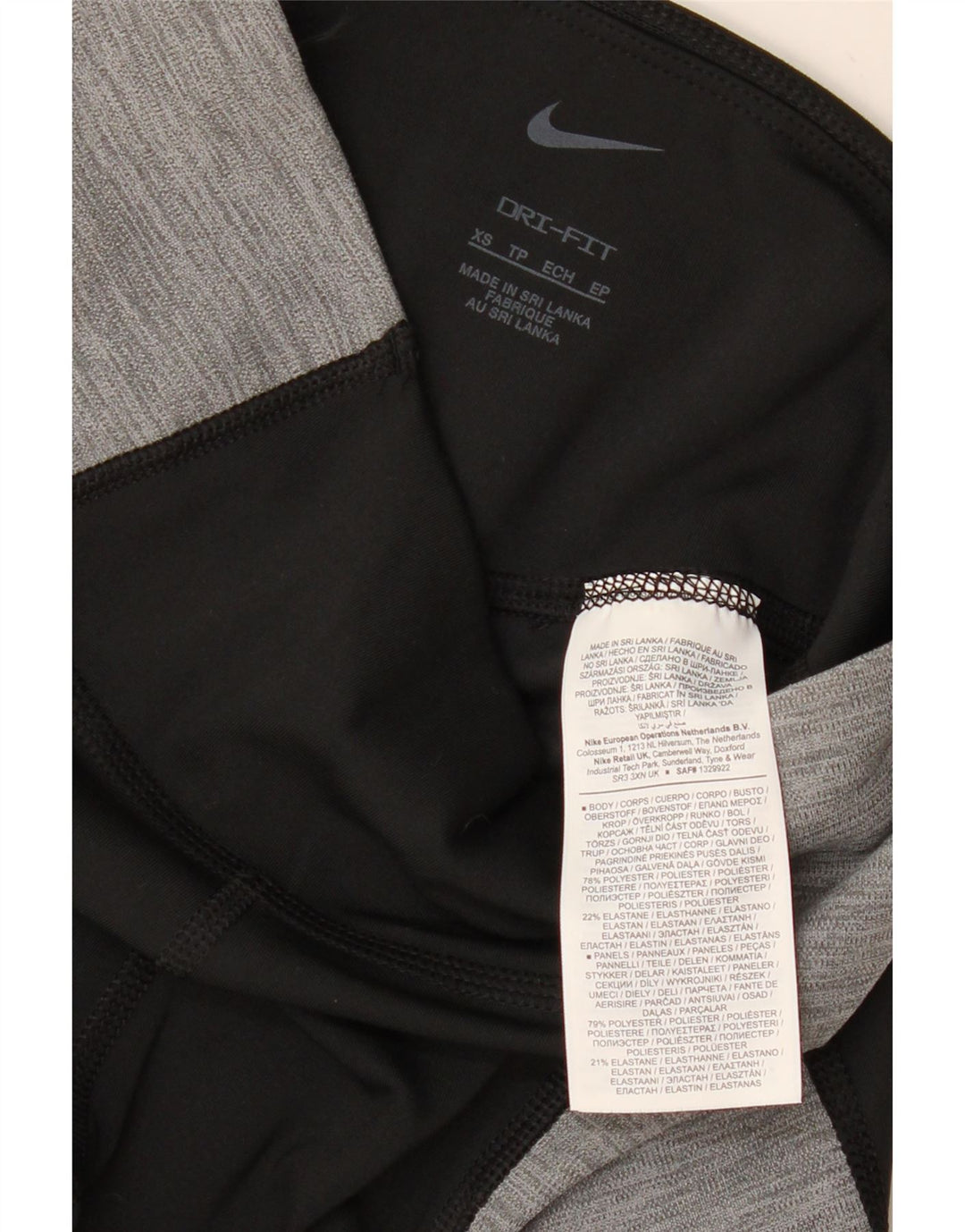 Damskie legginsy NIKE Dri Fit UK 4 XS, czarny poliester z blokami kolorów