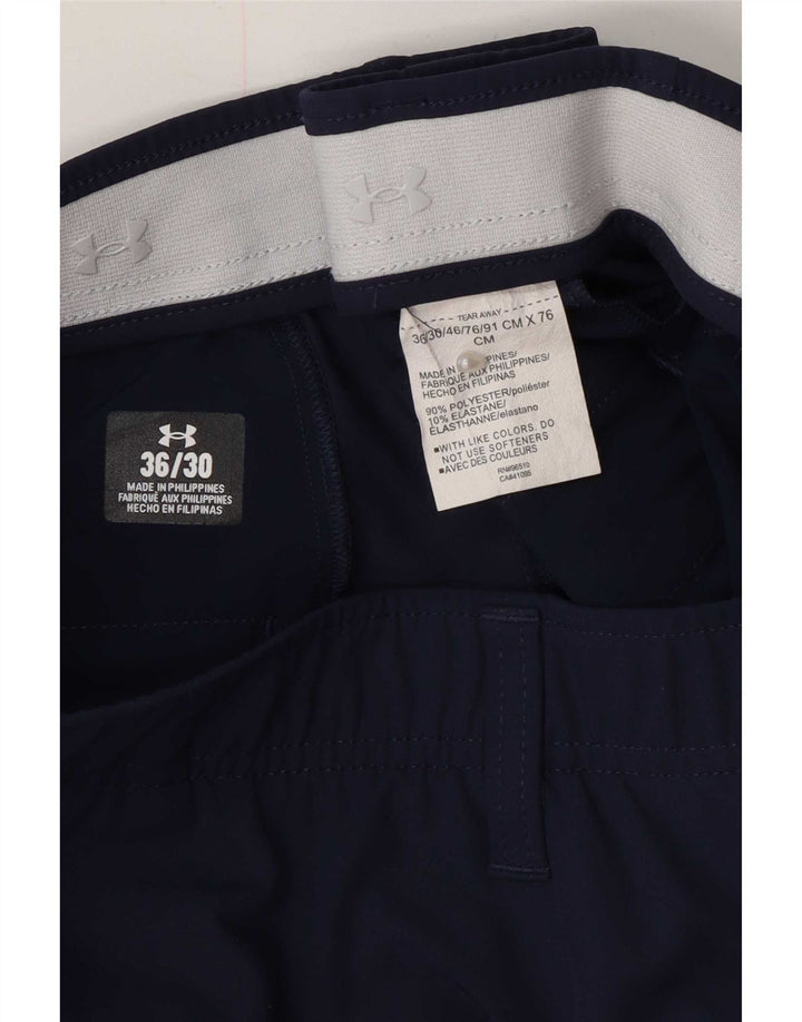 Męskie spodnie typu slim chino Under Armour W36 L30 granatowy poliester
