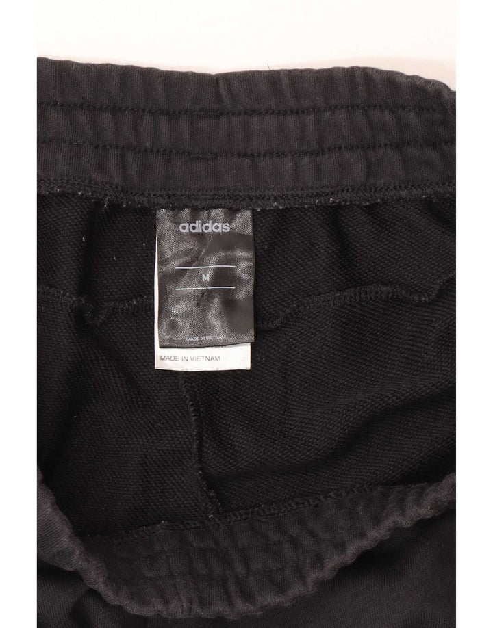 Damskie spodnie dresowe Adidas Climalite Graphic UK 12 Medium Black