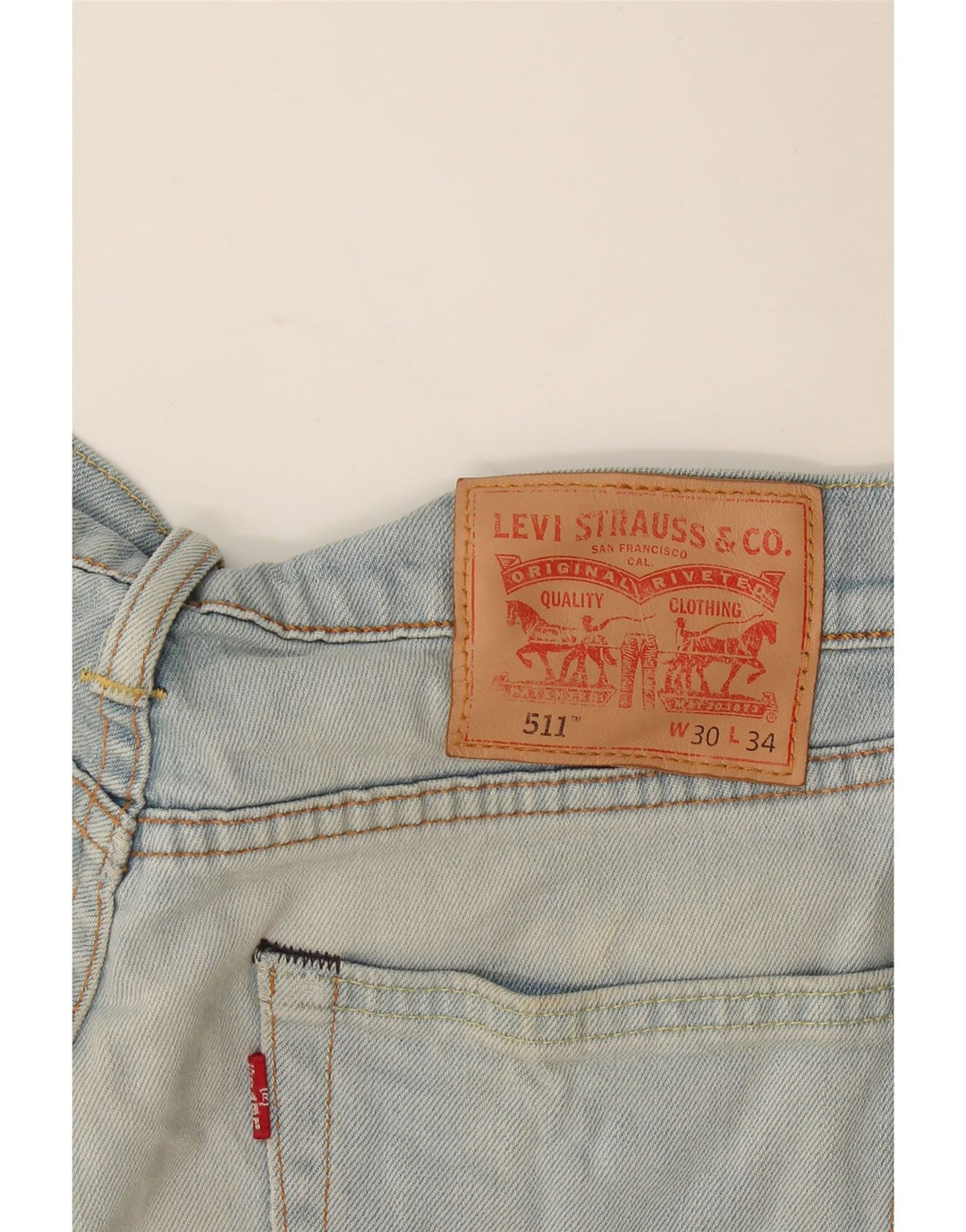 Damskie jeansy Levi's 511 Slim W30 L34 Niebieska bawełna