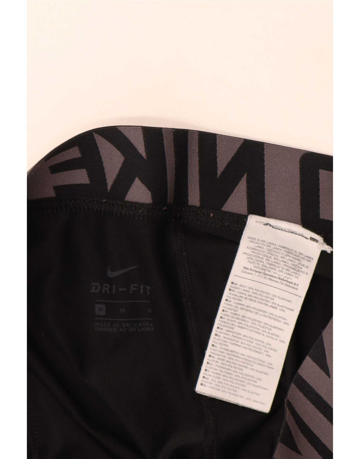 Damskie legginsy Nike Dri Fit Graphic UK 14, średni czarny poliester