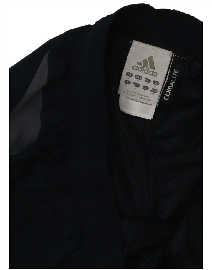 Męskie spodnie dresowe Adidas Climalite, średni granatowy poliester