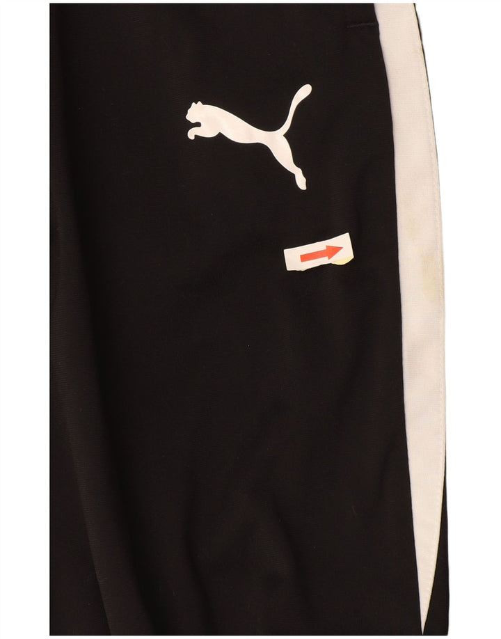Męskie spodnie dresowe Puma Joggery w małych czarnych blokach kolorów