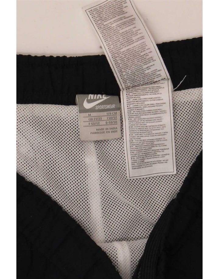 Męskie spodnie dresowe Nike Joggers, średni granatowy poliester