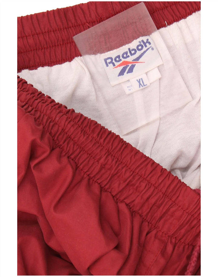 Męskie spodnie dresowe REEBOK Joggers XL Burgundowy poliester