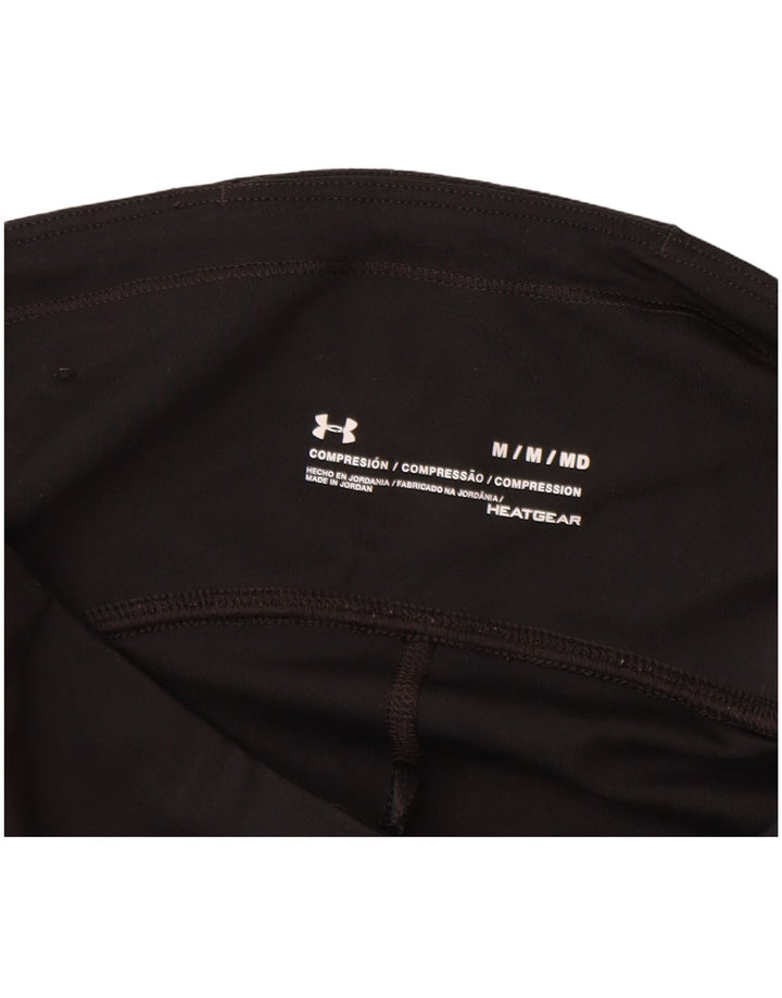 Damskie legginsy Nike Heat Gear UK 12, średnie czarne