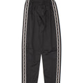 CHAMPION Mens Graphic Tracksuit Trousers Small Black Polyester Vintage Champion and Second-Hand Champion from Messina Hembry 