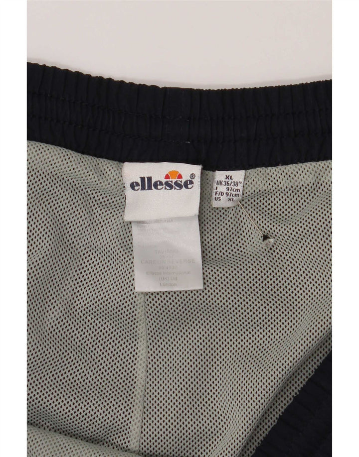 Męskie spodnie dresowe Ellesse XL, granatowe, poliestrowe