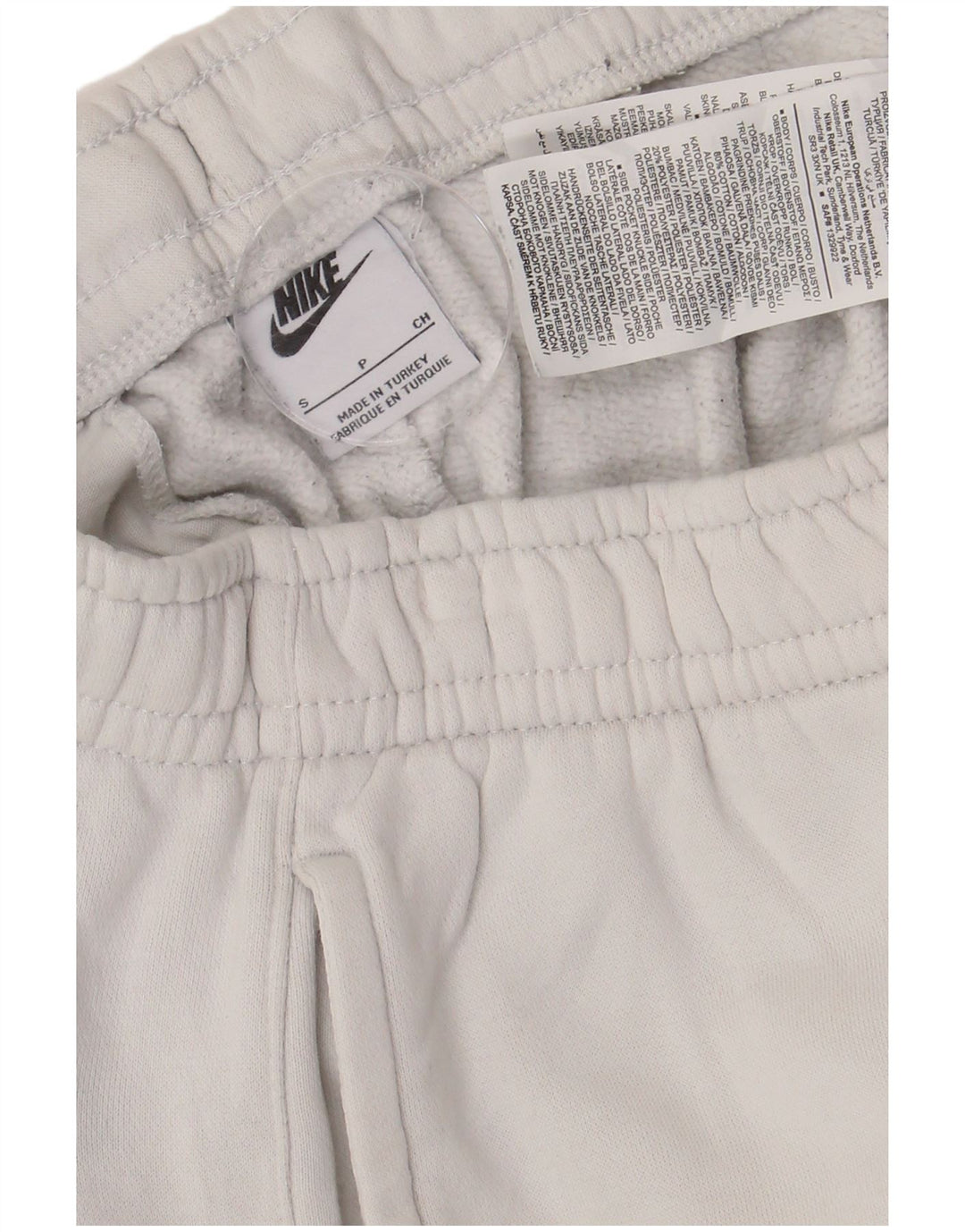 Męskie spodnie dresowe Nike z grafiką, małe, białe, bawełniane