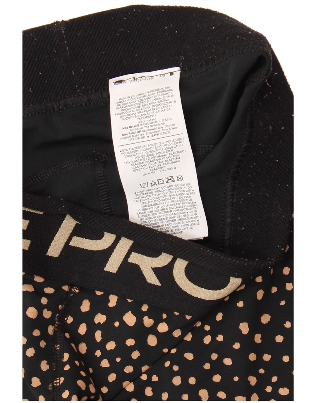 Damskie legginsy NIKE Graphic Capri UK 12, średnie, czarne, poliestrowe kropki
