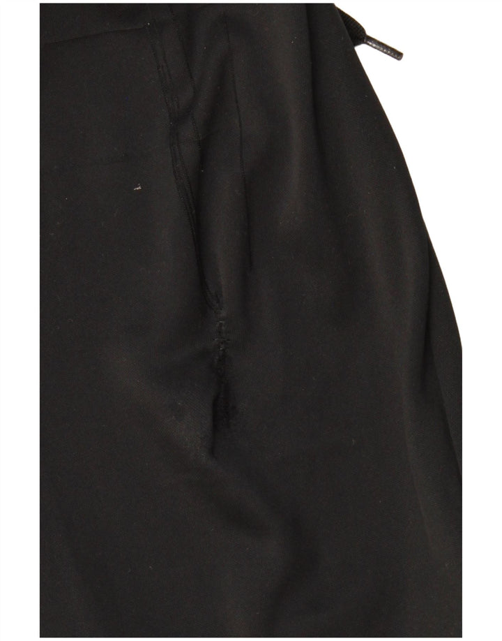 Męskie spodnie dresowe NIKE Dri Fit, duże czarne bloki kolorów