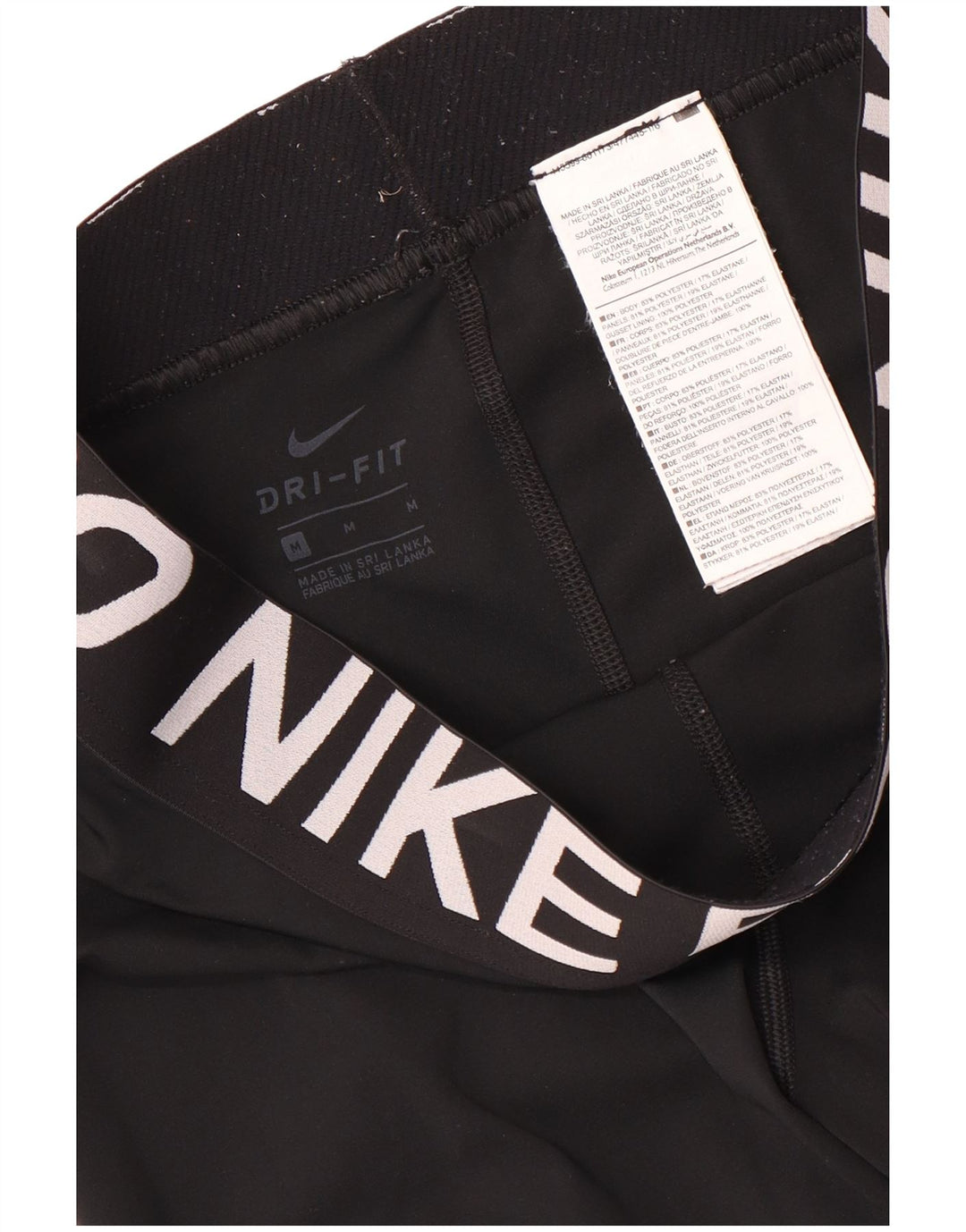 Damskie legginsy Nike Dri Fit Graphic Capri UK 12, średni czarny poliester