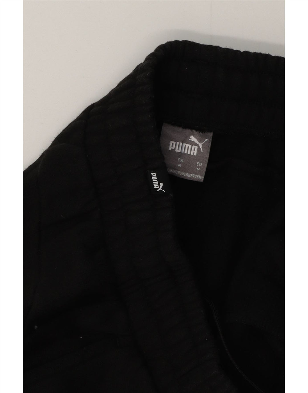 Męskie spodnie dresowe Puma, joggery, średnie czarne