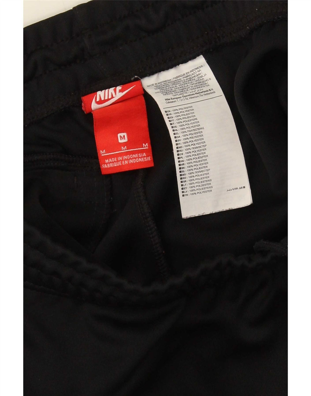 Męskie spodnie dresowe Nike Joggers, poliester w kolorze średniej czerni