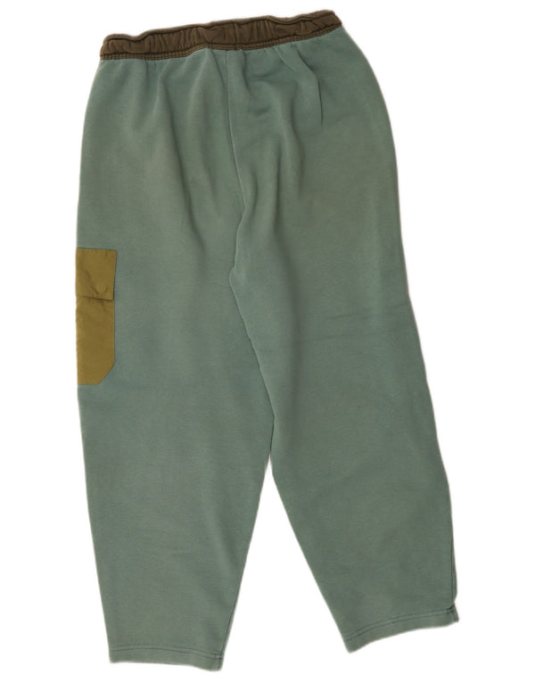 Męskie spodnie dresowe Nike Cargo Joggers w kolorze średniej zieleni