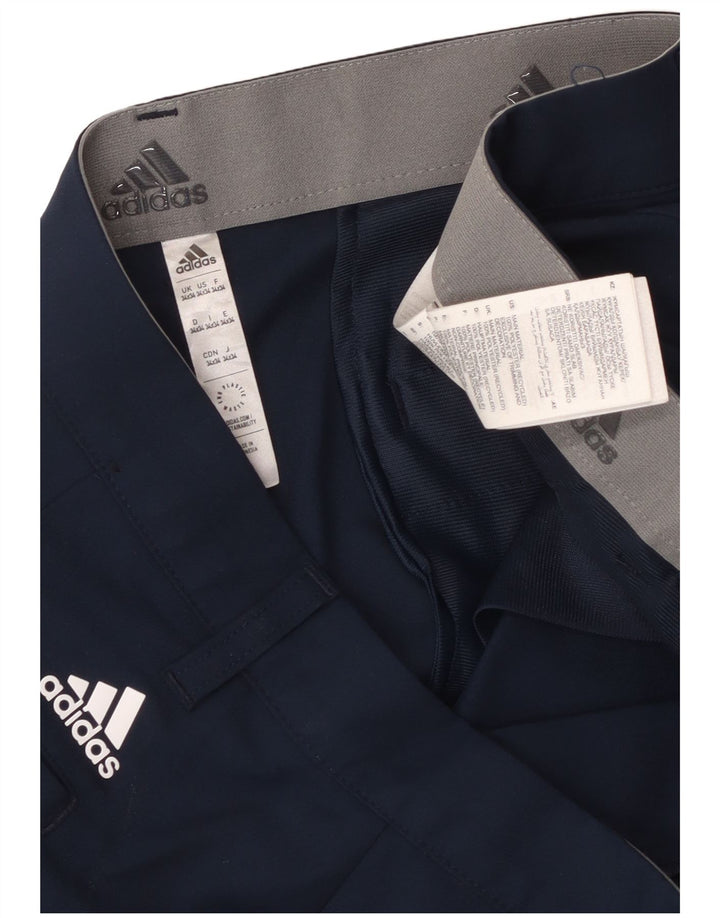 Spodnie męskie Adidas Slim Chino W34 L34 Granatowy poliester