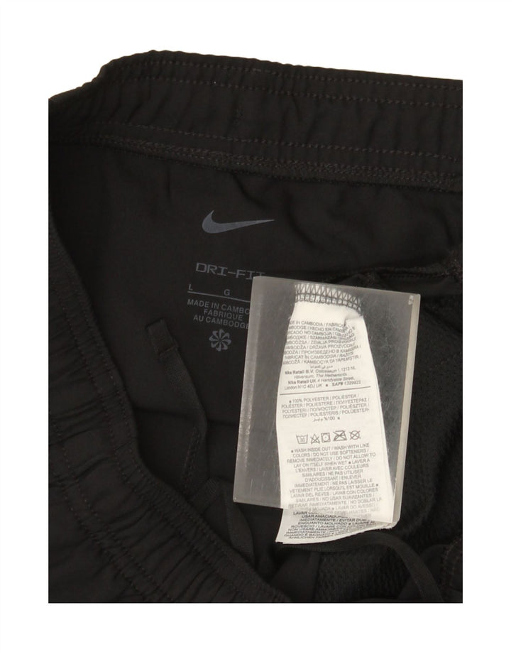 Damskie spodnie dresowe Nike Dri Fit UK 16, duże, czarne, poliestrowe