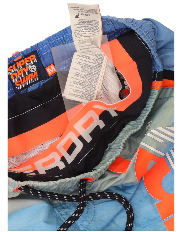 Męskie spodenki kąpielowe Superdry z grafiką, poliester w średnie niebieskie paski