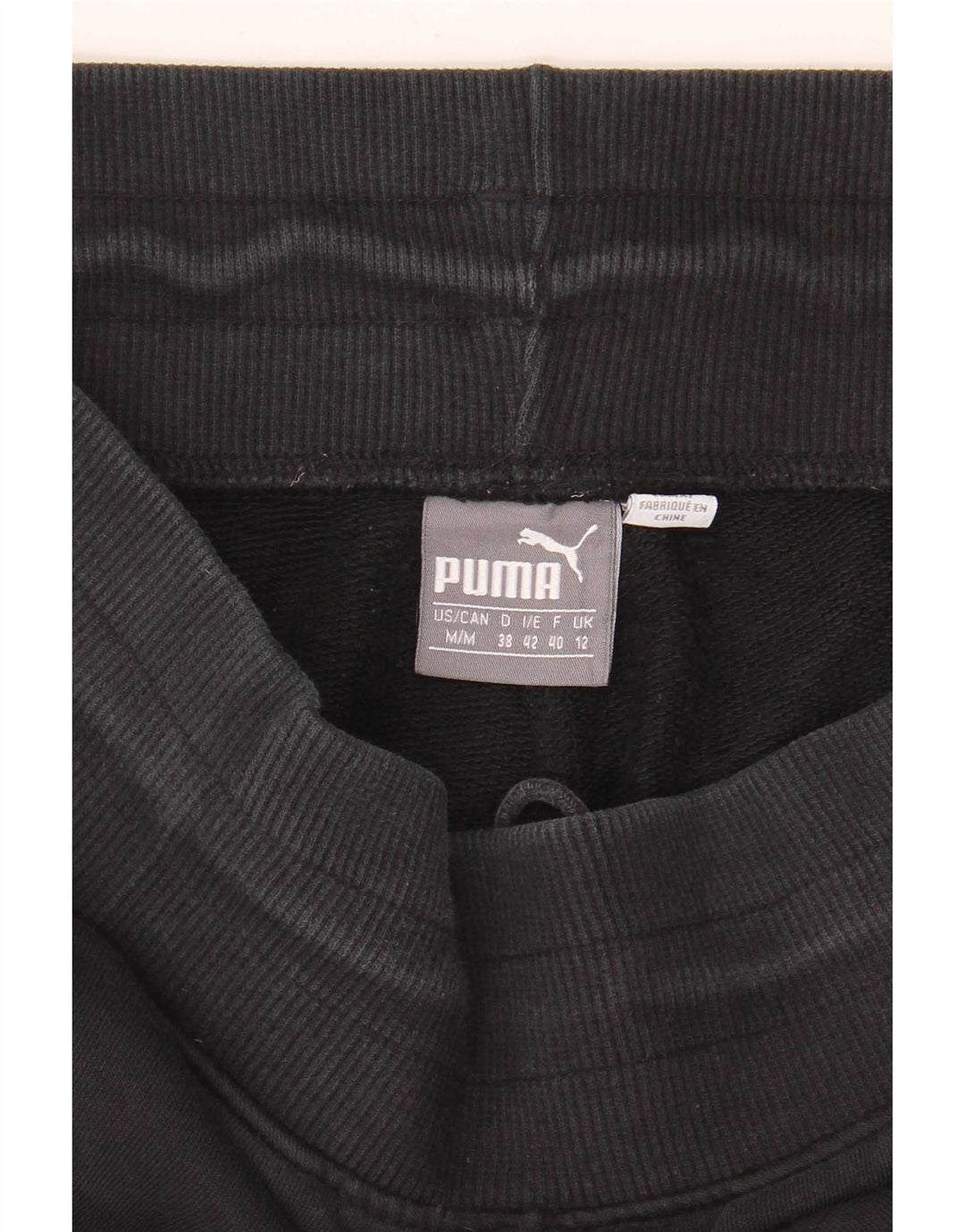 Damskie spodnie dresowe Puma Joggers UK 12 Średni czarny, blok kolorów