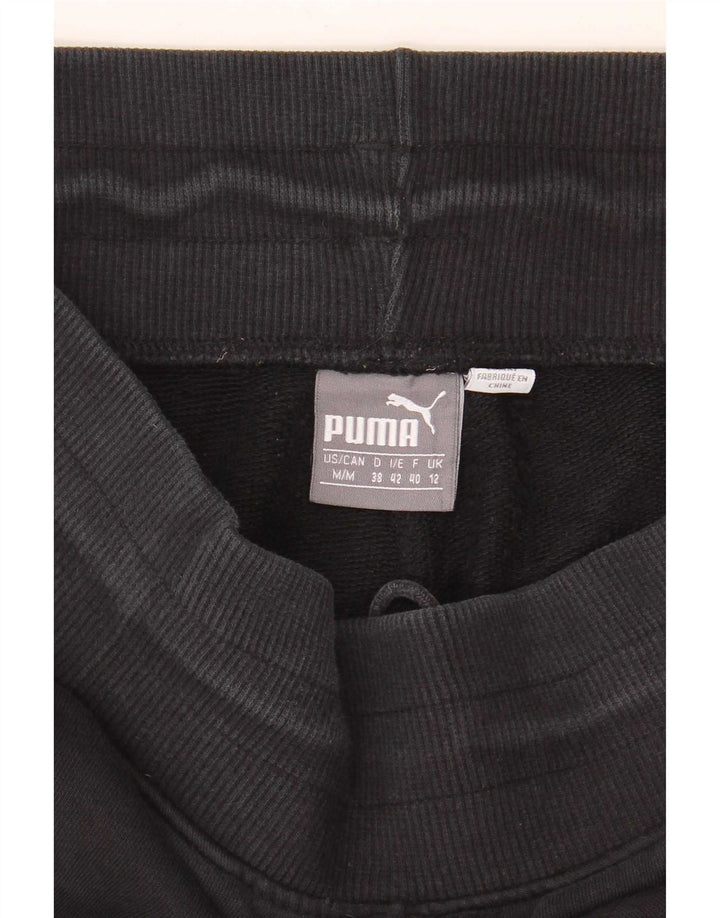 Damskie spodnie dresowe Puma Joggers UK 12 Średni czarny, blok kolorów