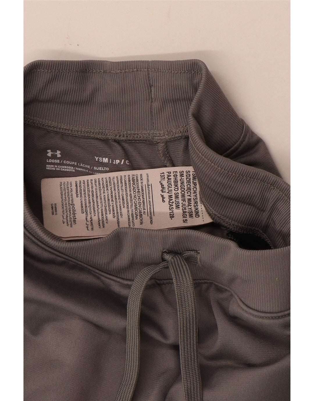 Spodnie dresowe chłopięce Under Armour, 7-8 lat, małe, szare