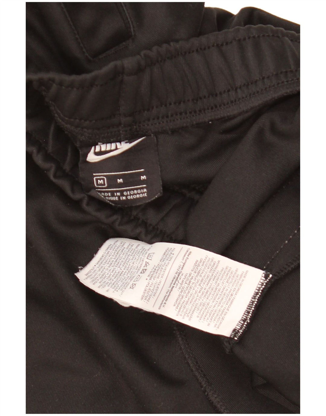 Męskie spodnie dresowe Nike Graphic, joggery, średni czarny poliester