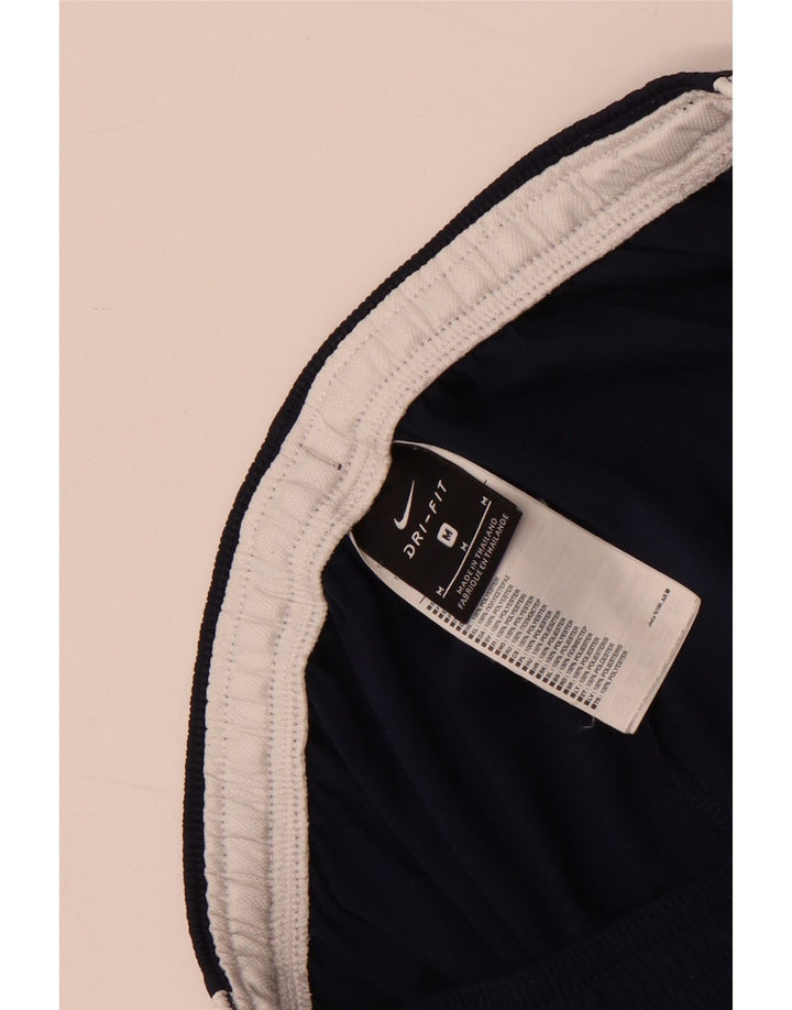 Męskie spodnie dresowe Nike Dri Fit, poliester w kolorze średniego granatu, w blokach kolorów