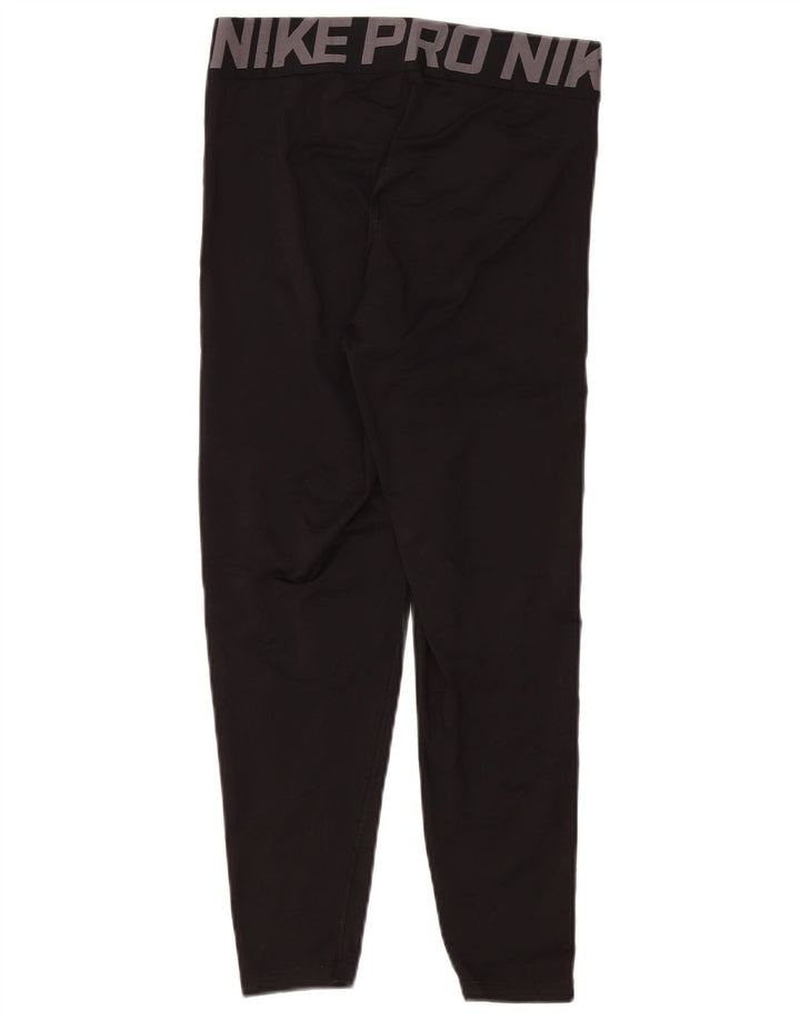 Damskie legginsy NIKE Dri Fit Graphic UK 10, małe, czarne, poliestrowe