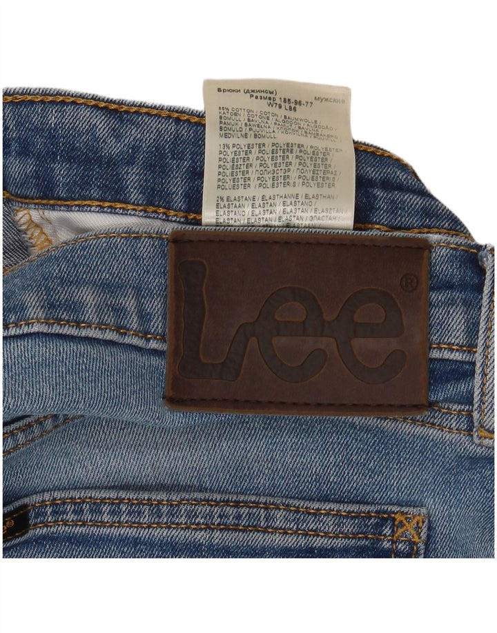 Męskie jeansy Lee Luke Tapered W31 L34 z niebieskiej bawełny