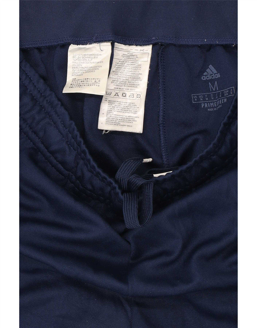 Męskie spodnie dresowe Adidas Primegreen, średni granatowy poliester