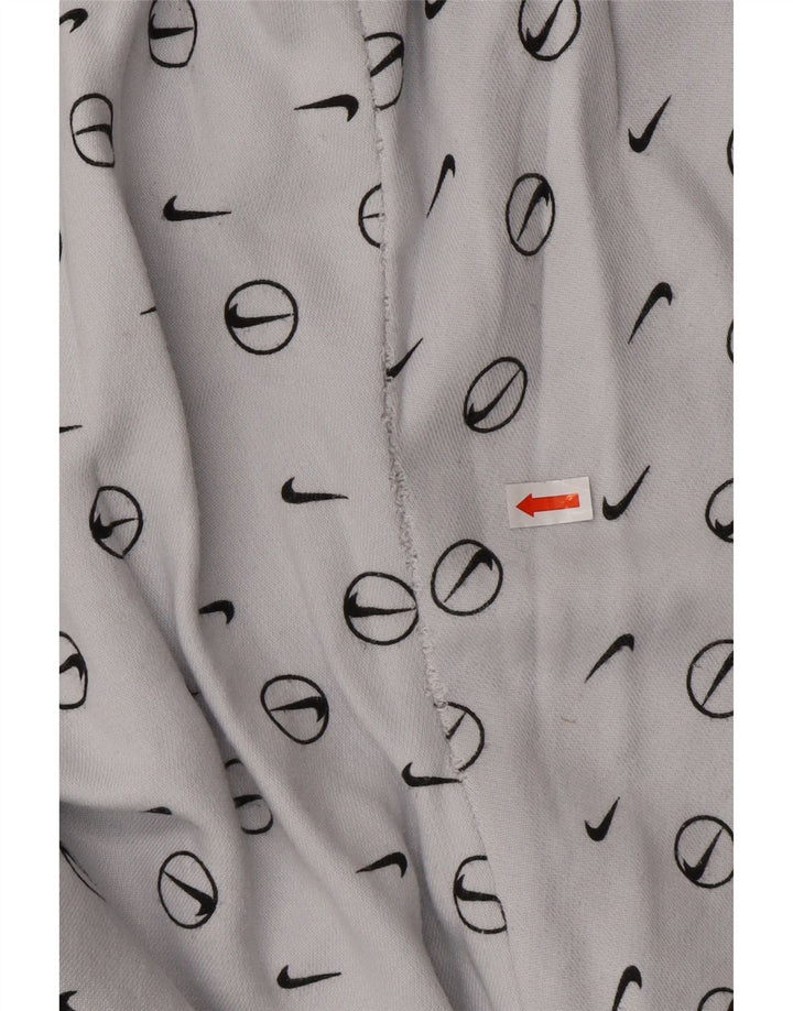 Męskie spodnie dresowe NIKE o luźnym kroju z grafiką, małe, niebieskie, bawełniane