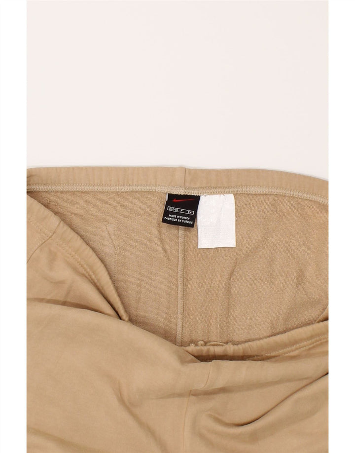 NIKE Womens Tracksuit Trousers US 4/6 Small Beige Cotton Vintage Nike and Second-Hand Nike from Messina Hembry 