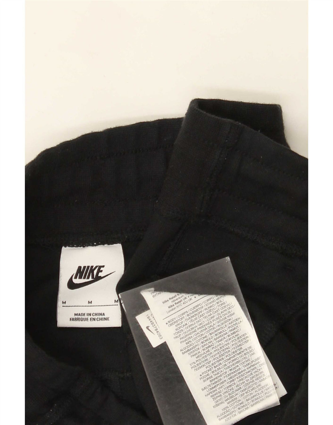 Męskie spodnie dresowe Nike Cargo Joggers, średnia czarna bawełna