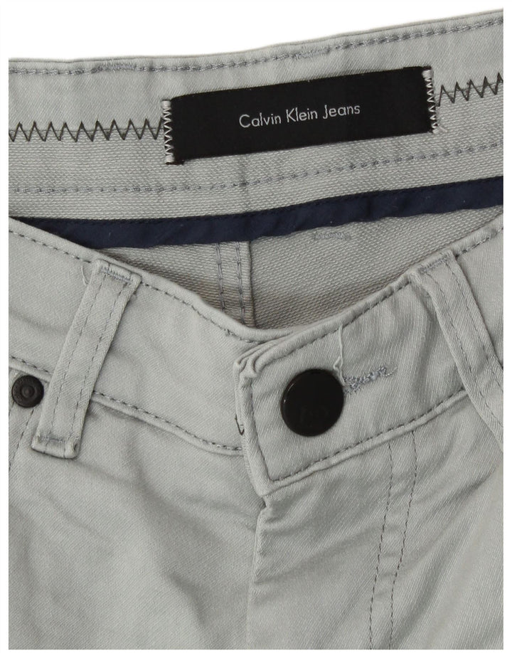 Męskie jeansy obcisłe Calvin Klein W32 L30 Niebieskie bawełniane