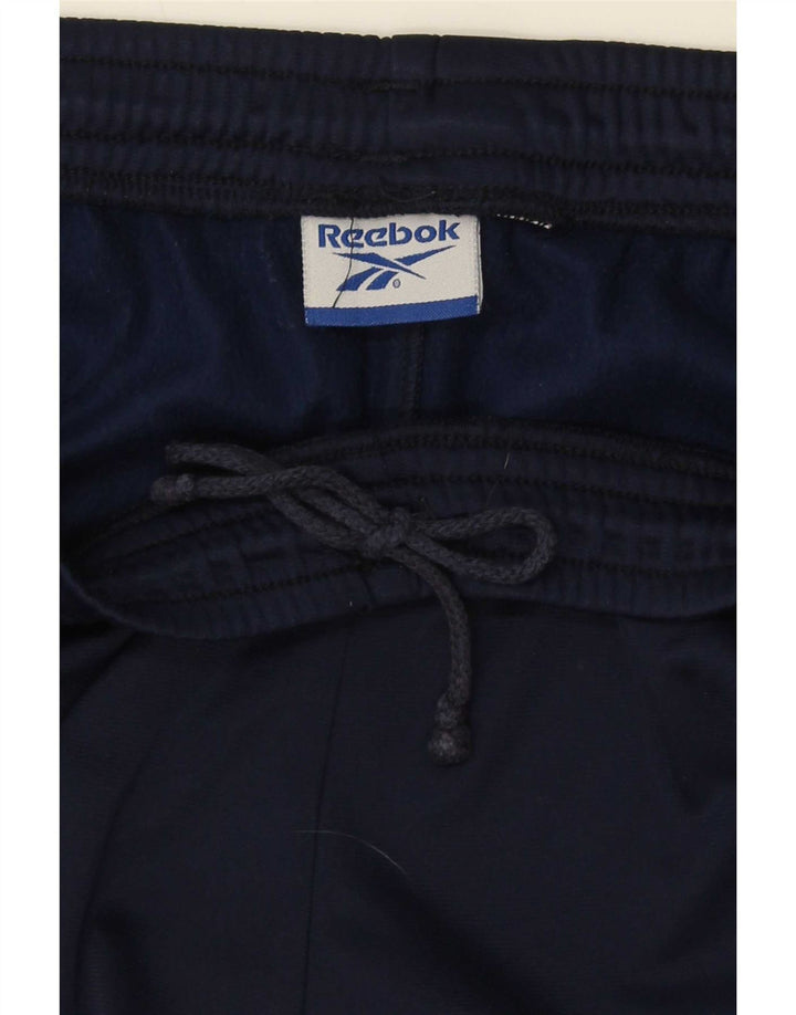 Męskie spodnie dresowe Reebok, duże, granatowe, z blokami kolorów