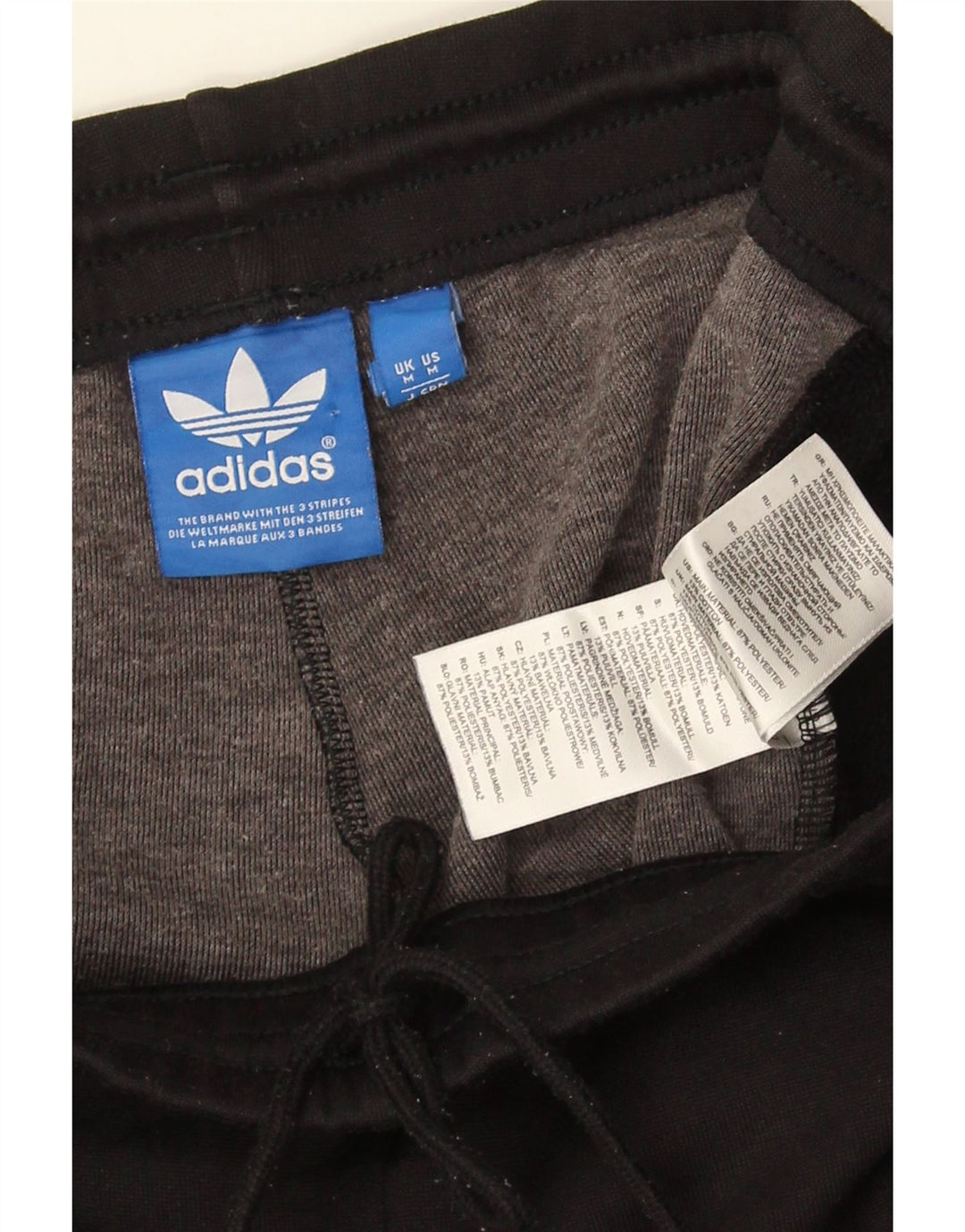 Męskie spodnie dresowe Adidas z grafiką, średni czarny poliester z blokami kolorów