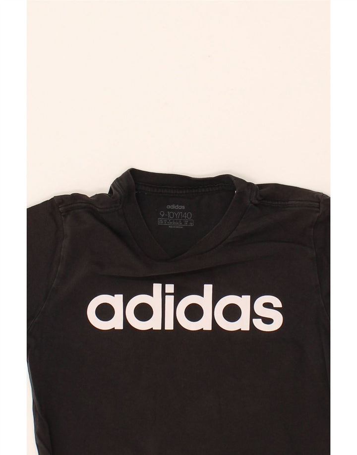ADIDAS Boys Graphic T-Shirt Top 9-10 Years Black Vintage Adidas and Second-Hand Adidas from Messina Hembry 