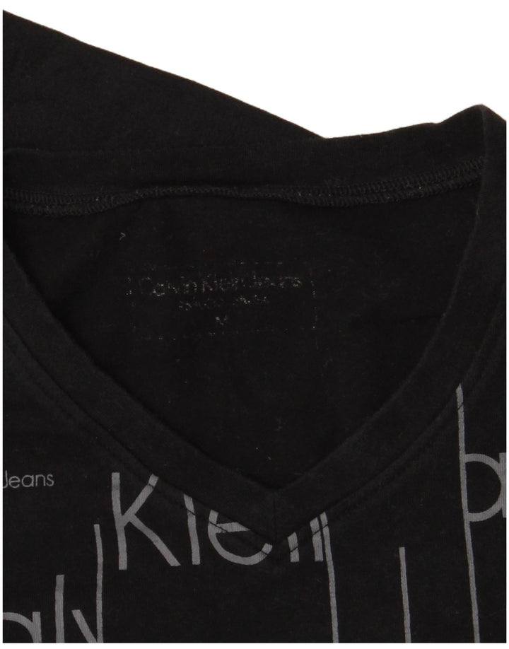 Damski top z grafiką Calvin Klein Jeans z długim rękawem, UK 12, średni czarny