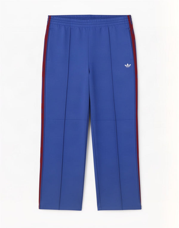 Damskie spodnie dresowe Adidas Graphic UK 16, duże, niebieskie, z blokami kolorów
