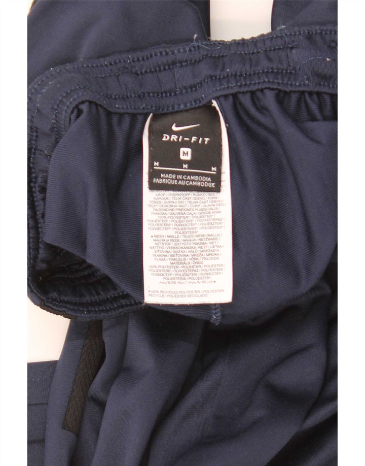 Męskie spodnie dresowe Nike Dri Fit, poliester w kolorze średniego granatu, w blokach kolorów