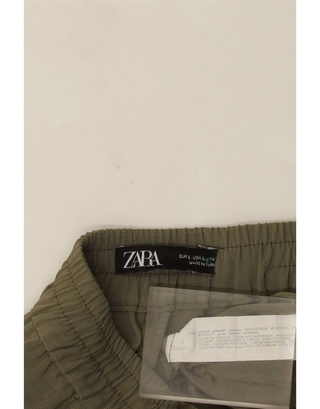 Damskie, zwężane spodnie Zara, duże, W32 L24, khaki, poliester