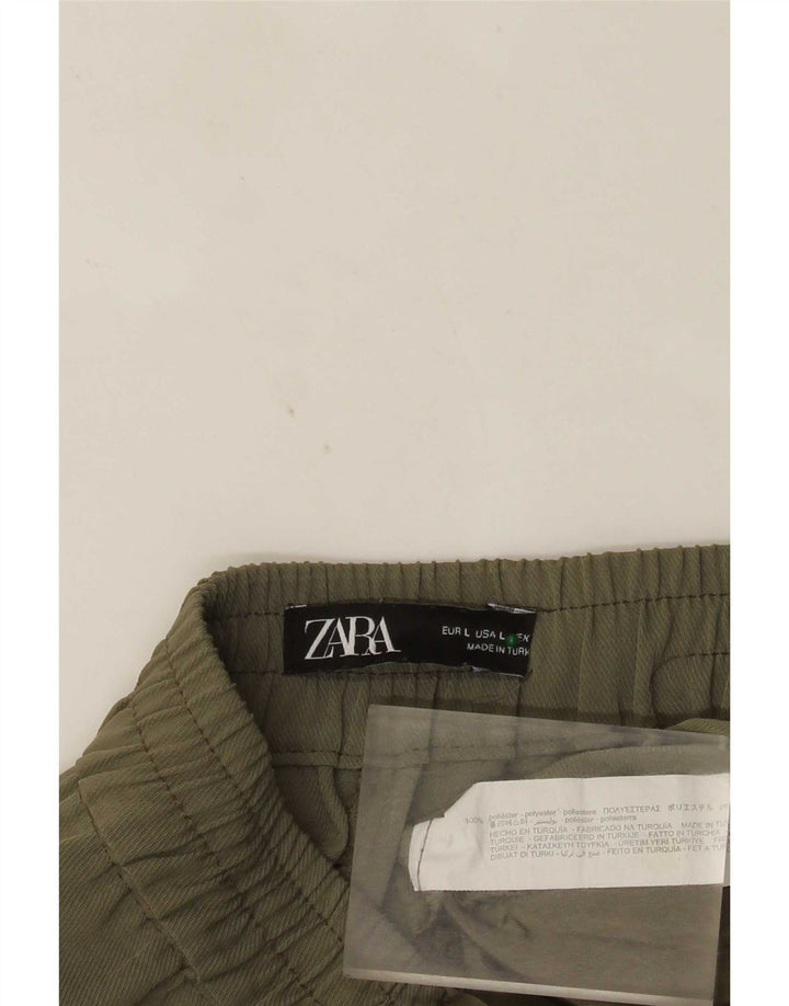 Damskie, zwężane spodnie Zara, duże, W32 L24, khaki, poliester