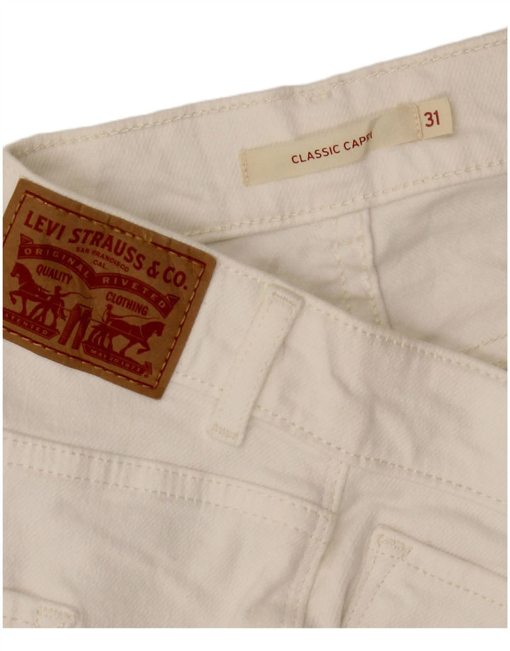 Damskie klasyczne dżinsy Capri LEVI'S W31 L21 białe