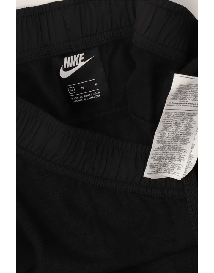 Męskie spodnie dresowe Nike Graphic Joggers, średnia czarna bawełna