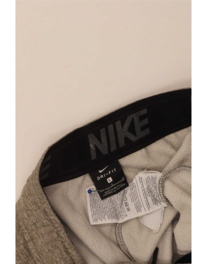 Męskie spodnie dresowe Nike z grafiką, duże, poliestrowe w kolorze khaki