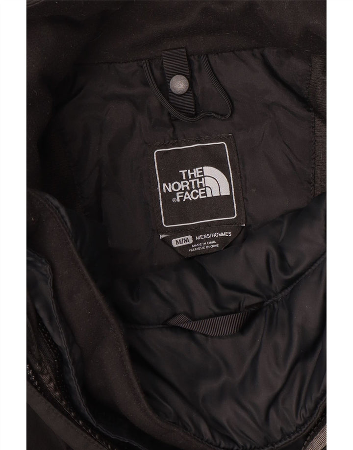 Męska kurtka wiatrówka z kapturem The North Face UK 38, średni czarny poliester