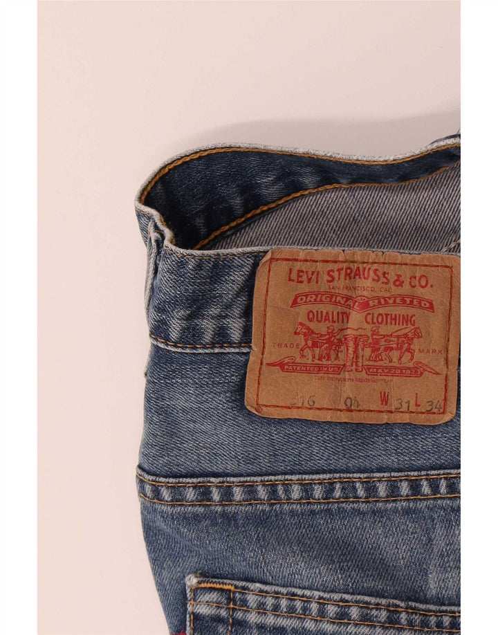 Damskie jeansy Levi's 516 Bootcut W31 L34 Niebieska bawełna